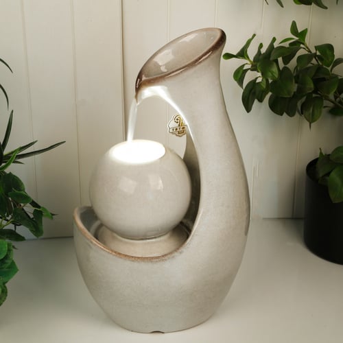 نافورة مياه مضيئة بتصميم عصري باللون الابيض اللؤلؤ...