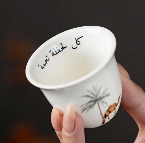 Coffee cups with the palm tree logo