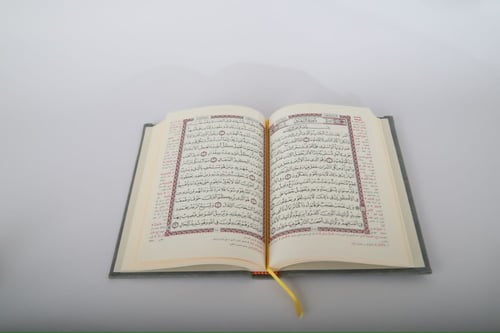 مصحف جلد بتفسير