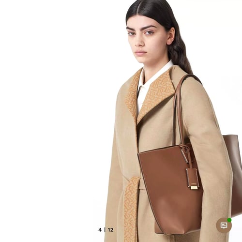 شنطة بربري كبيره اللون بني Monogram Motif Leather...