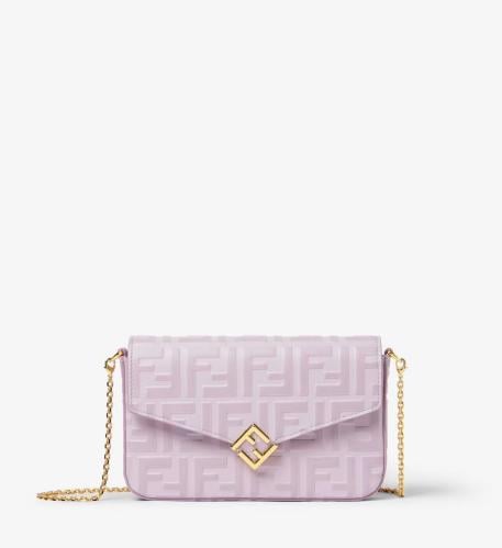 A bag from Fendi in lavender color with a chain and box
