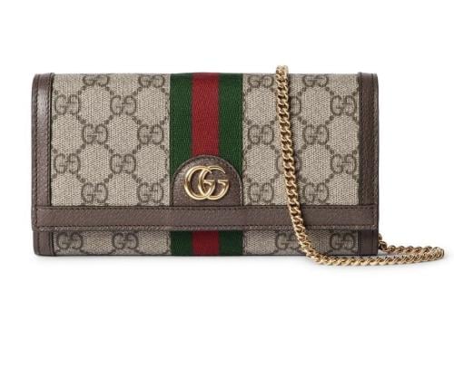 Gucci bag with a necklace, box, and Gucci card