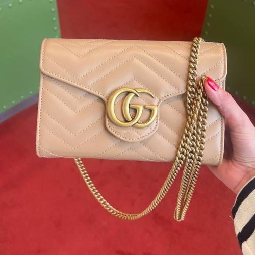 Gucci bag, nod and watch, with necklace, complete accessories