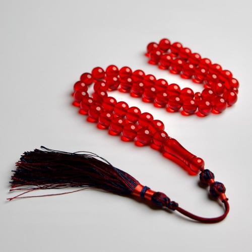 سبحة زعفراني أحمر شفاف