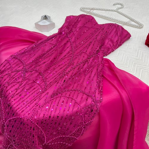 فستان سهرة مطرز راق