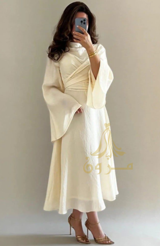 فستان "سيرين" اللؤلؤي – فخامة الكسرات والتصميم الم...