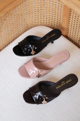 Louis Vuitton heels in a hanging