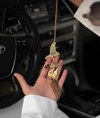 تعليقة سيارة عود مع رسمة الصقر