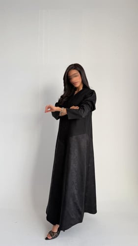 ‏E70