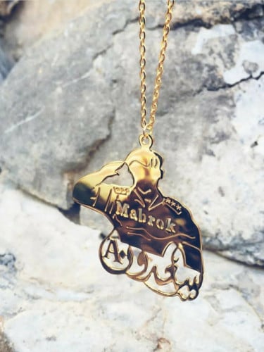 تعليقة عسكرية للسيارة بالاسم