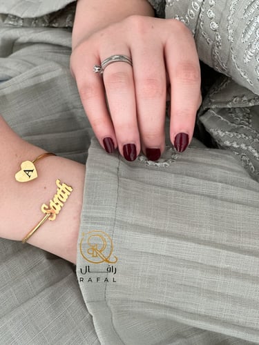 اسوارة بالاسم والحرف مطلي ذهب