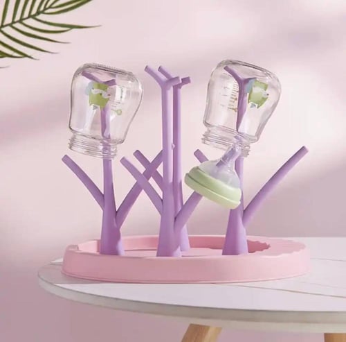 حامل رضاعة ( زجاجة الحليب) بألوان زاهية