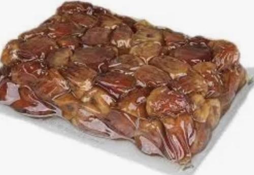 A carton of sweet dates, half a kilogram