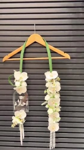 عقد تخرج وردي فاخر – لمسة رومانسية ليوم التخرج