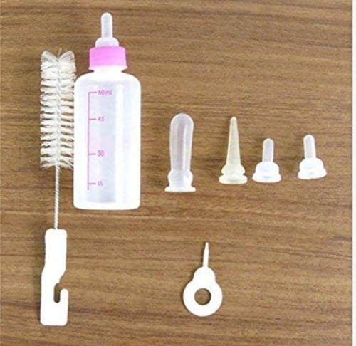 رضاعه صغيره الحيوانات الأليفة مع فرشاة تنظيف للقطط...