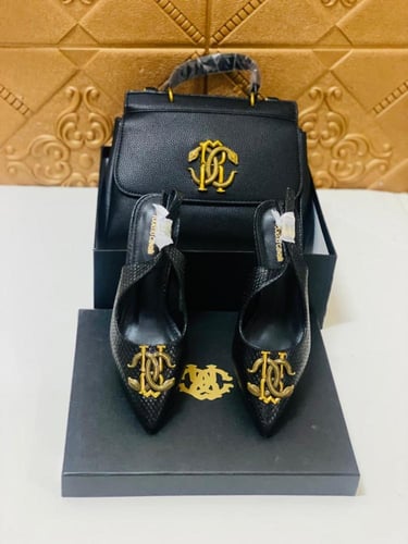 كعب وشنطه ماركة روبرتو كفالي شنطة وكعب ماركه أديدا...