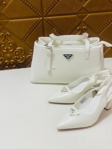 كعب وشنطه ماركة برادا شنطة وكعب ماركه برادا شوزات...