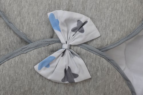 كوفله بمسند رقيق بالاضافه الى أطراف قطنية لحمايه ر...