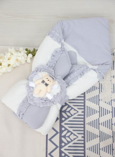 بطانية ومدس مواليد مع شريط مربوط