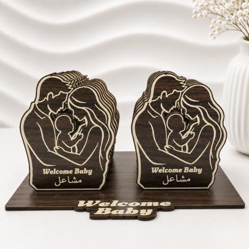 توزيعات مواليد شكل أب وأم وطفل عدد 12 قطعة