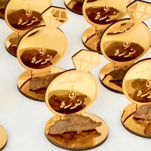 توزيعات زواج - تصميم خاتم بأسماء العرسان