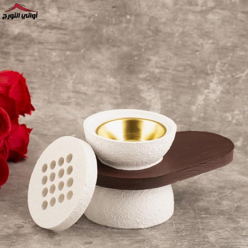 مبخر أبيض بيد