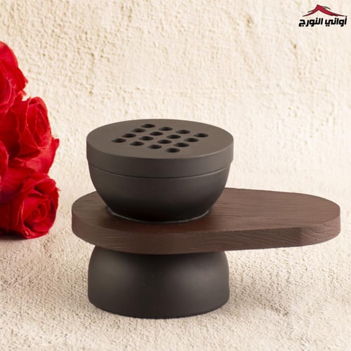 مبخر أسود بيد