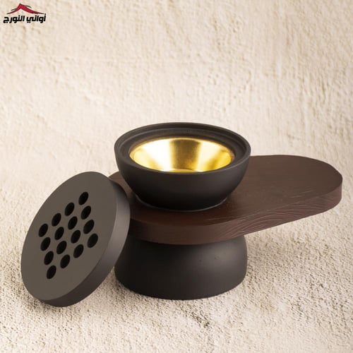 مبخر أسود بيد