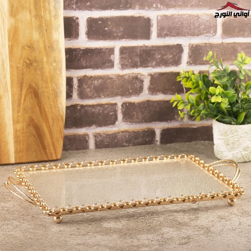 تبسي نسرين زجاج بإيطار ذهبي