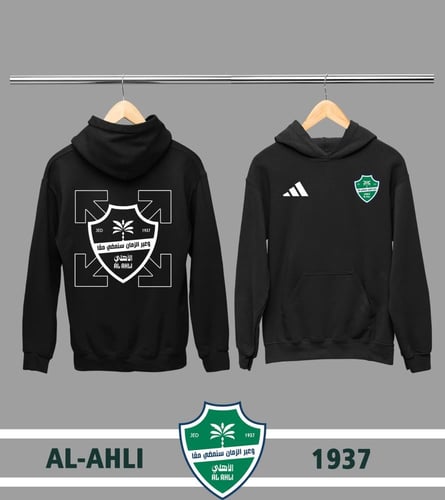 بلوفر شتوي بتصميم شعار الأهلي