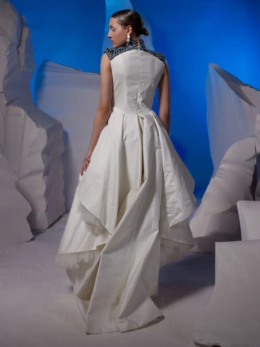 One piece floor length dress with added flounce at...