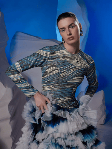High-low hem gown with an ombre ghera and net fril...