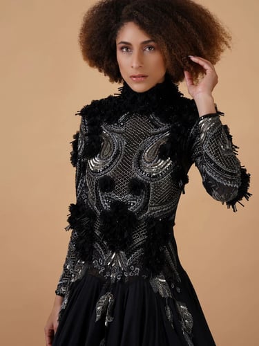 A black cotton silk floor length gown with zero ne...