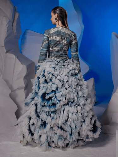 High-low hem gown with an ombre ghera and net fril...
