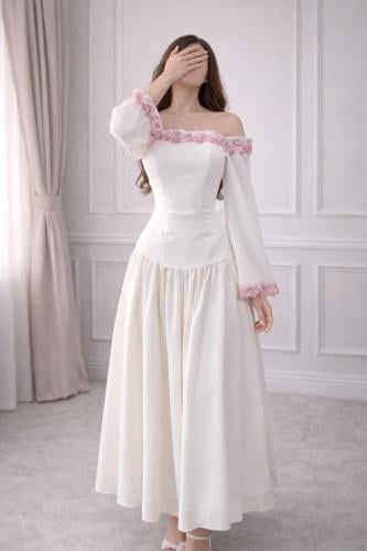 فساتين عيد فخمة - فستان ابيض أنيق بتنورة كلوش