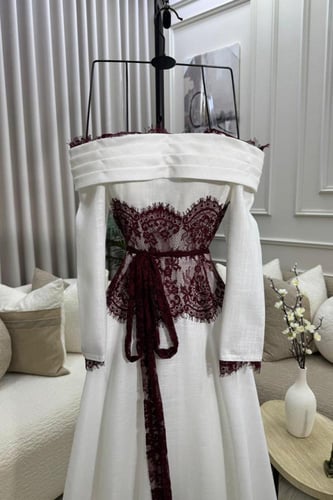 فساتين استقبال العيد 2026 - فستان لنن أبيض مع دانت...