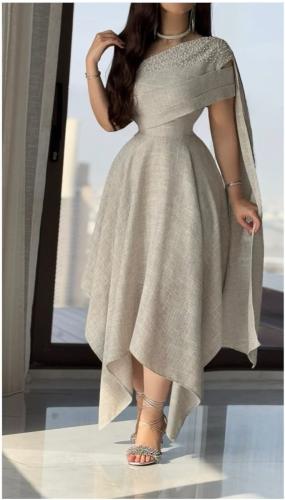 فستان أوف وايت بكتف واحد مطرز لول بتصميم أنيق