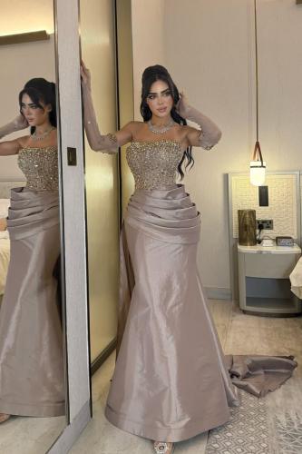 فستان سهرة ملكي لون بيج داكن بتصميم حورية