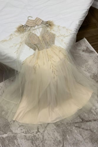 فستان سهرة مطرز كريستال وتول ذهبي - فساتين سهره فخ...