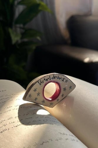 فاصل كتابي بعبارة "لاخوف على إمرؤ يقرأ "