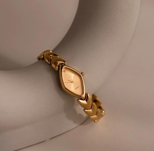 ساعة أوريون باللون الذهبي