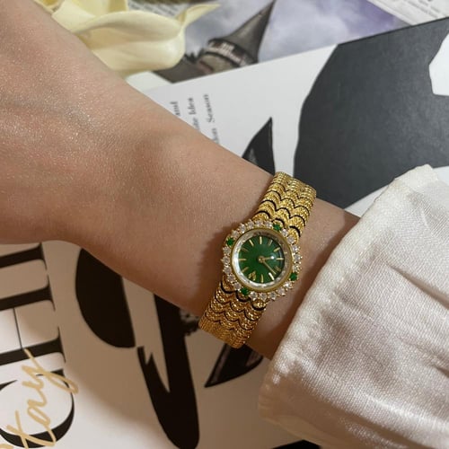 ساعة زمردة الخضراء