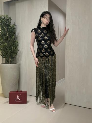 فستان سهرة أسود وذهبي ترتر بشراشيب - تيمانة