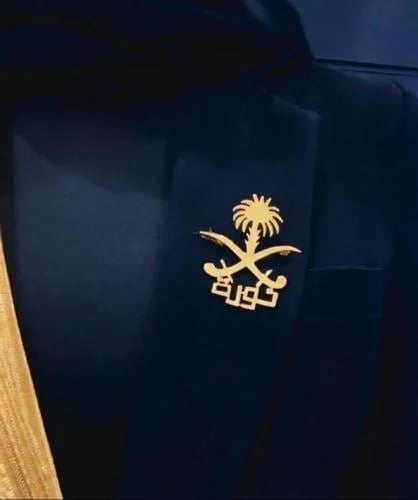 بروش بالاسم مع سيفين ونخلة