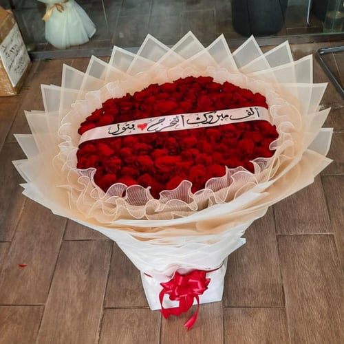 بوكيه 100 وردة حمراء جوري