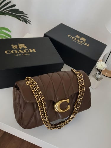 شنطة درجة أولى مستوحاه من كوتش