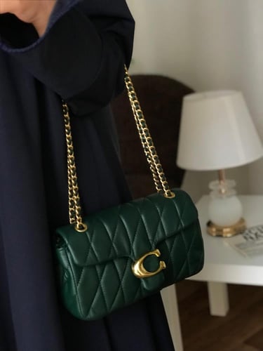 شنطة درجة أولى مستوحاه من كوتش