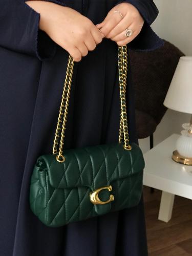 شنطة درجة أولى مستوحاه من كوتش