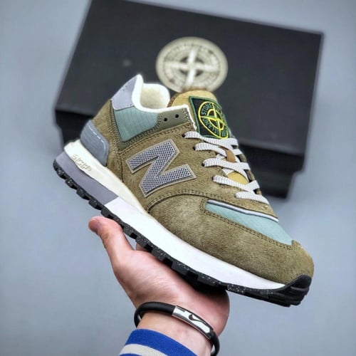 ‏New Balance 574