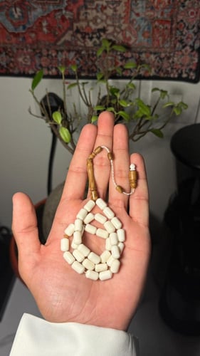 مسباح عظم جمل مع خشب كوك